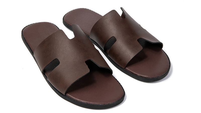 alt="PU slippers with smooth matte upper showing polyurethane material used in premium slipper manufacturing"