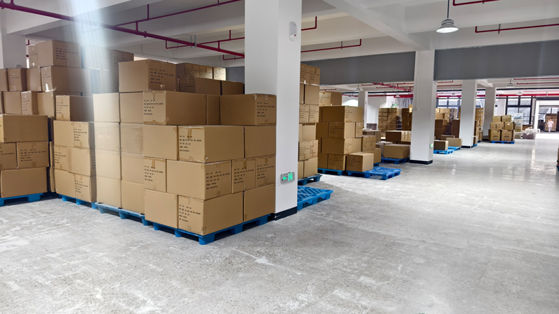 Slipper factory warehouse with boxed bathroom slippers prepared for bulk wholesale and OEM shipment