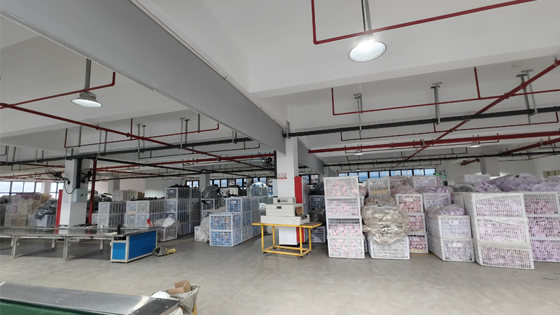 PU and EVA slipper factory packing and storage area with finished footwear prepared for wholesale orders